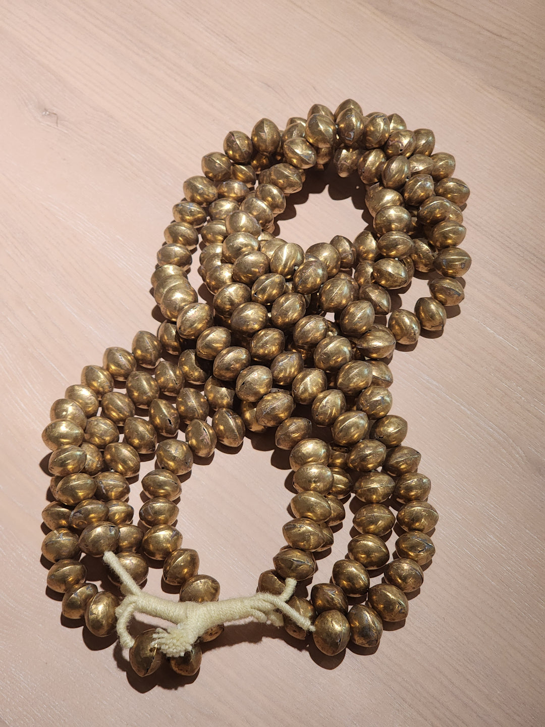 Four Strand Brass Bell Beads