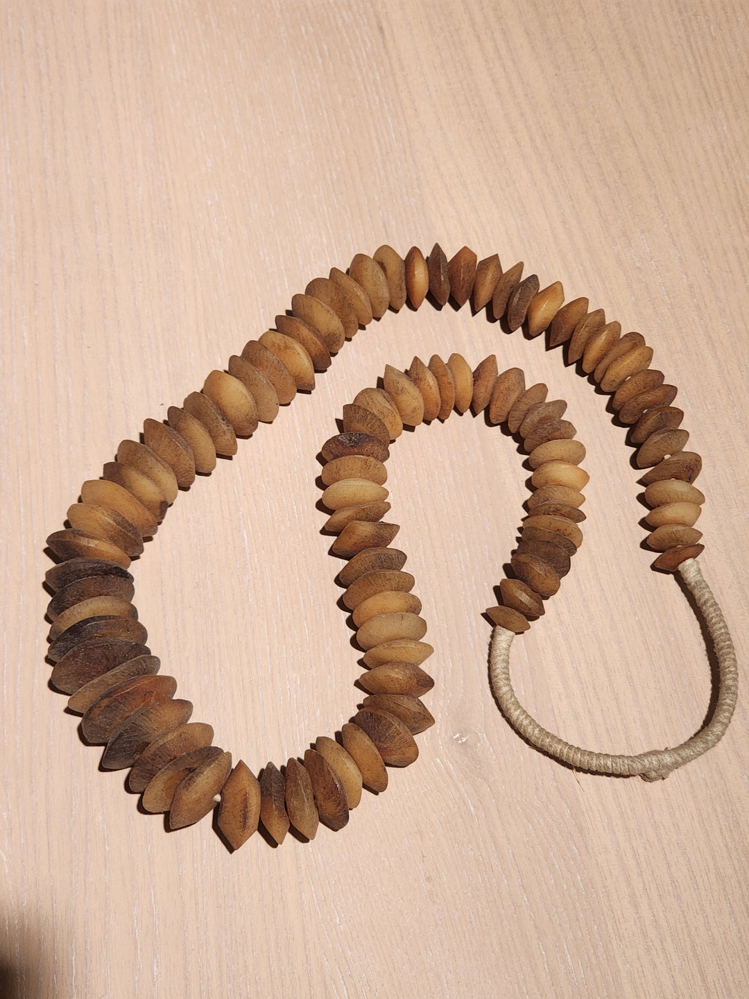 Textured Flat Bone Bead Strand